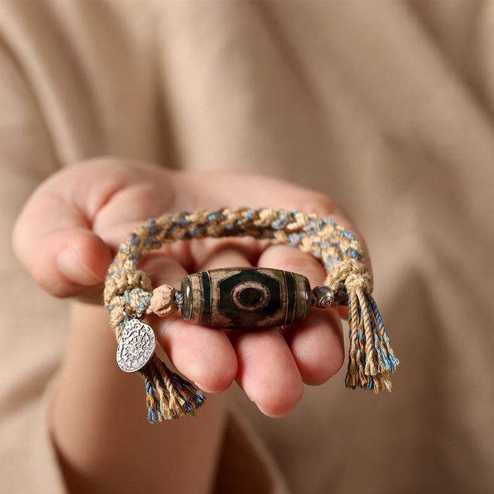 Bracelet tressé en perles dzi tibétaines faites à la main avec Buddha Stones - image 5