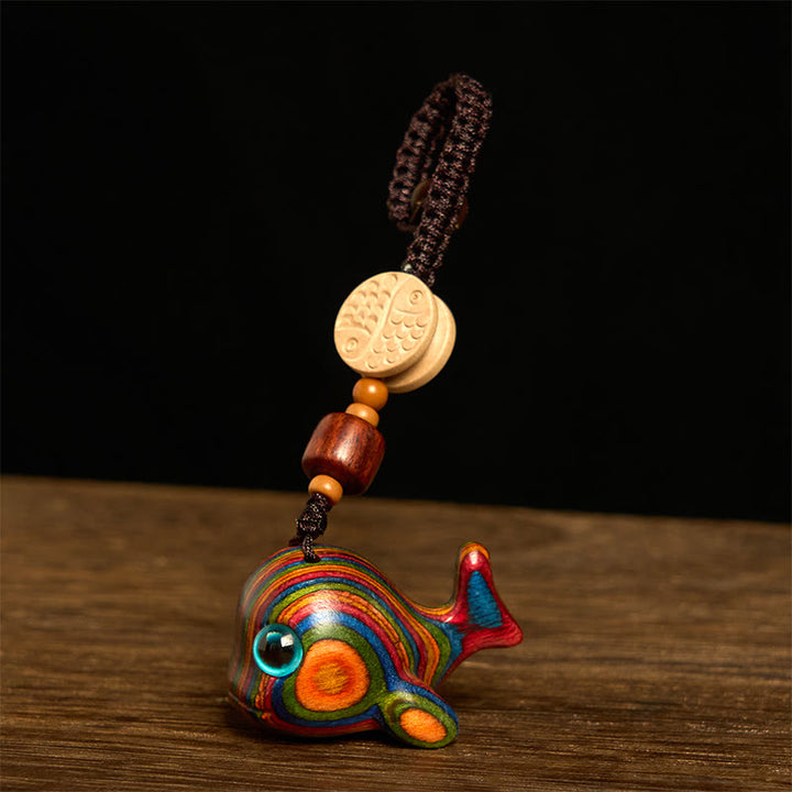 Porte-clés en Buddha Stones arc-en-ciel en eucalyptus sculpté en forme de dauphin, décoration à suspendre pour téléphone - Porte-clés - image 0