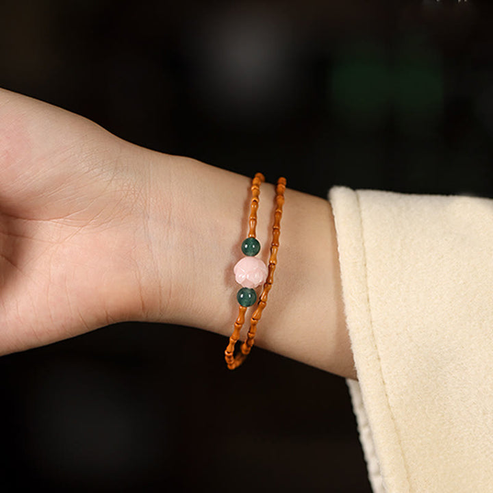 Buddha Stones Bracelet double cercle en noyau d'olive ultra-fin et lotus, pour une force intérieure renforcée. - image 7