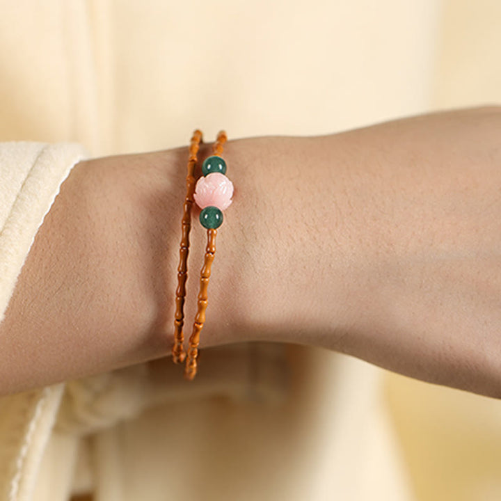 Buddha Stones Bracelet double cercle en noyau d'olive ultra-fin et lotus, pour une force intérieure renforcée. - image 4