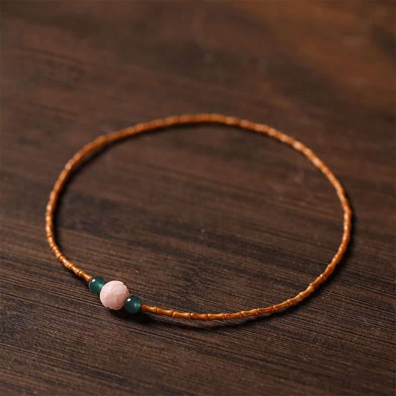 Buddha Stones Bracelet double cercle en noyau d'olive ultra-fin et lotus, pour une force intérieure renforcée. - image 2