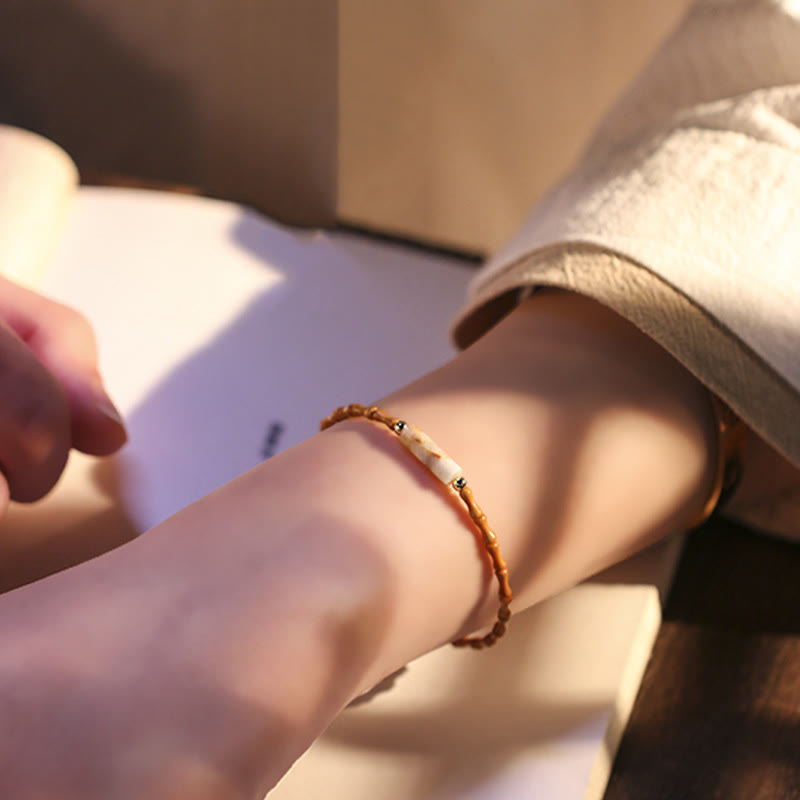 Bracelet de paix ultra-fin en noyaux d'olive Buddha Stones - image 5