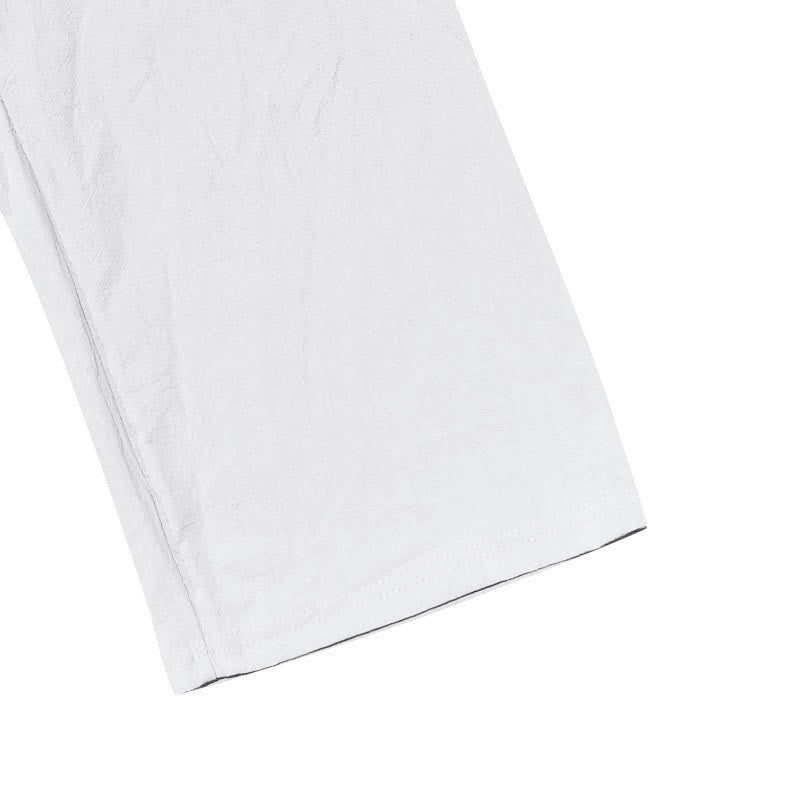 Pantalon en coton pour homme avec poches et boutons de couleur unie et cordon de serrage - image 13