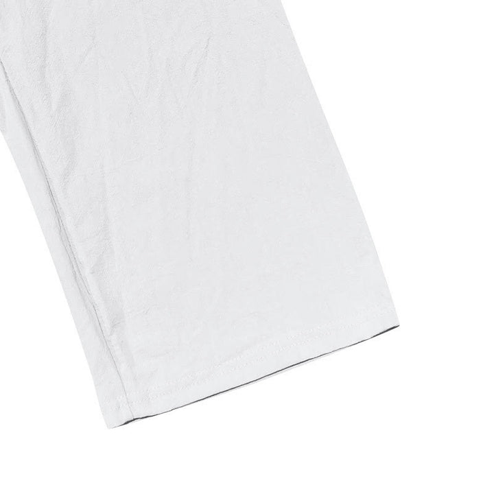Pantalon en coton pour homme avec poches et boutons de couleur unie et cordon de serrage - image 13
