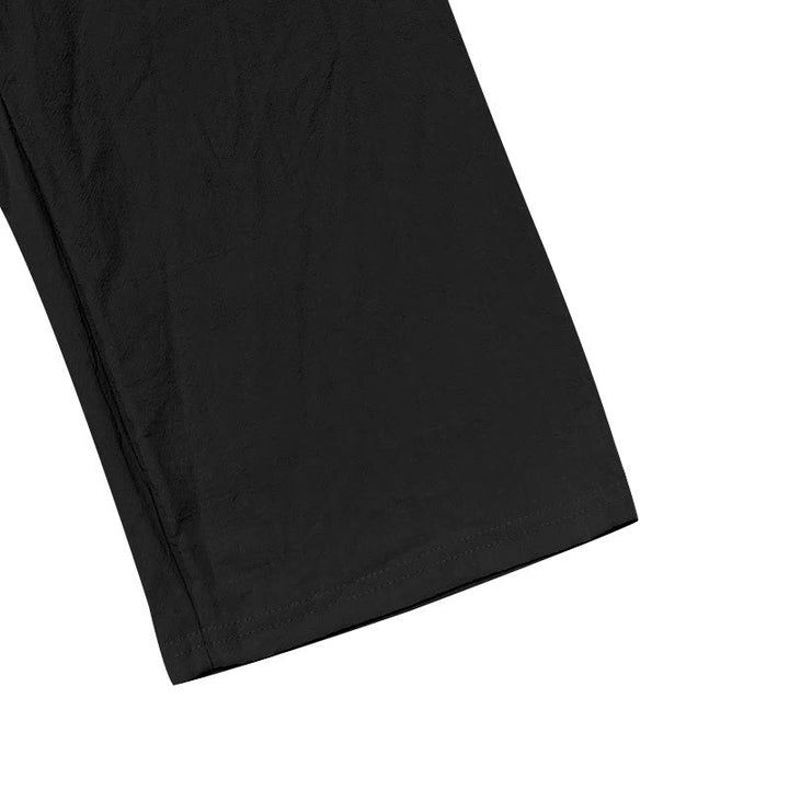 Pantalon en coton pour homme avec poches et boutons de couleur unie et cordon de serrage - image 13