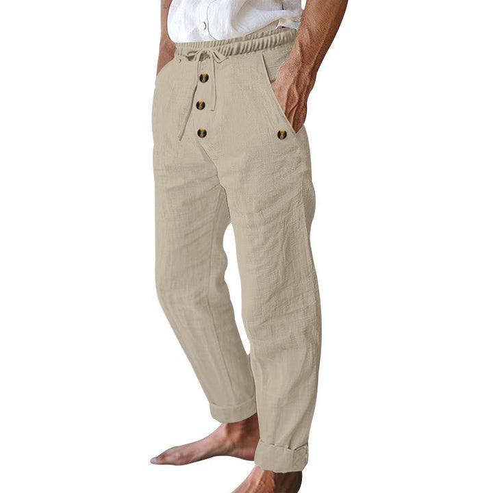 Pantalon en coton pour homme avec poches et boutons de couleur unie et cordon de serrage - image 37