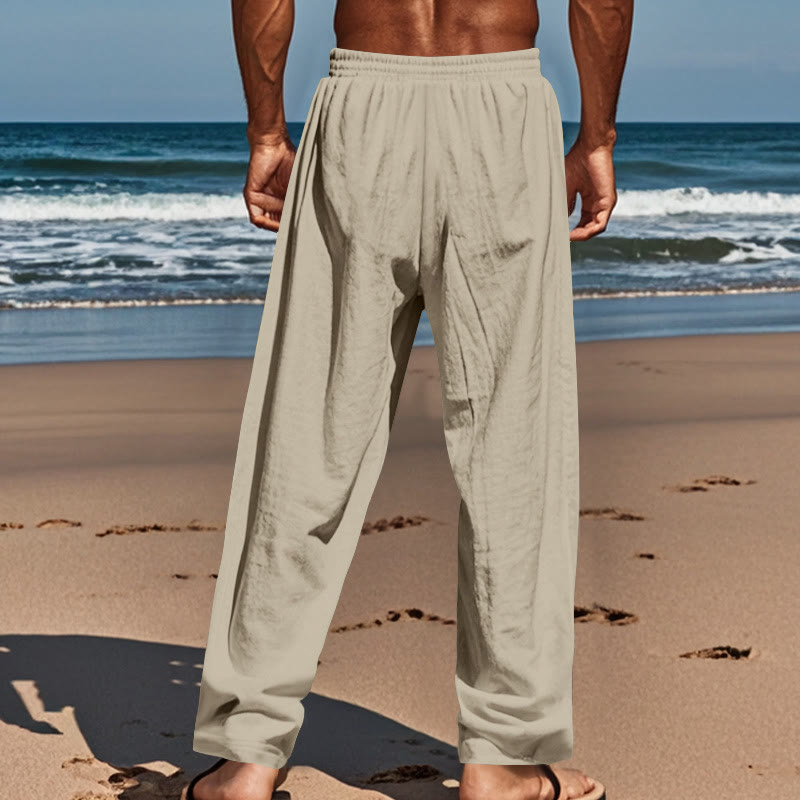 Pantalon en coton pour homme avec poches et boutons de couleur unie et cordon de serrage - image 36