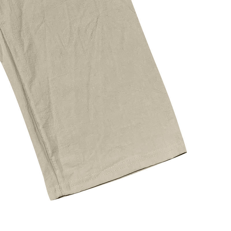 Pantalon en coton pour homme avec poches et boutons de couleur unie et cordon de serrage - image 24