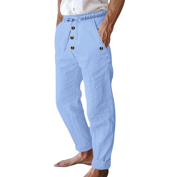 Pantalon en coton pour homme avec poches et boutons de couleur unie et cordon de serrage - image 44