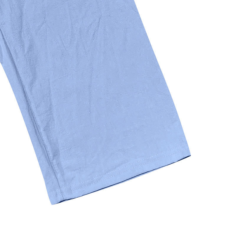 Pantalon en coton pour homme avec poches et boutons de couleur unie et cordon de serrage - image 46
