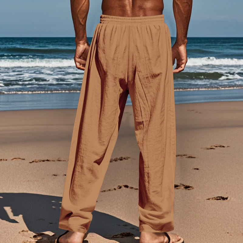 Pantalon en coton pour homme avec poches et boutons de couleur unie et cordon de serrage - image 50