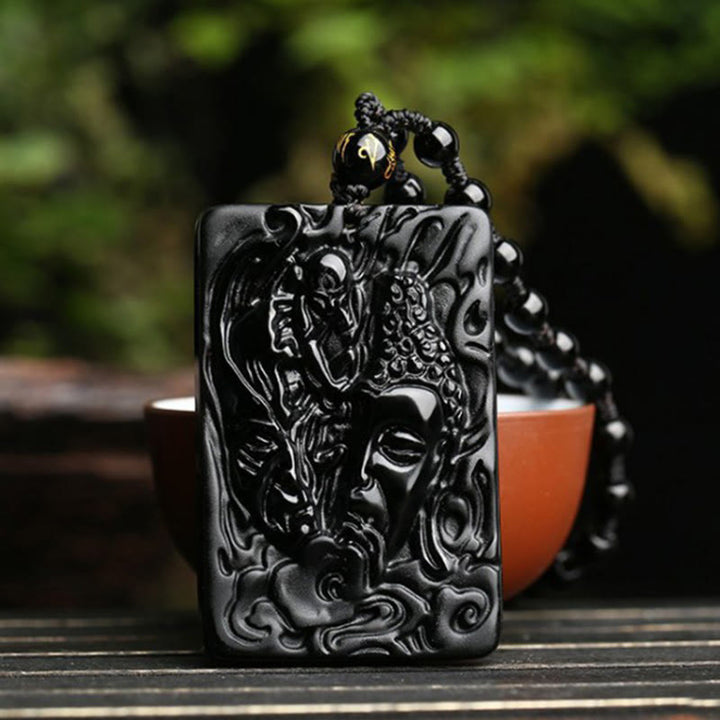 Buddha Stones pendentif en obsidienne noire naturelle avec motif de diable et de Bouddha