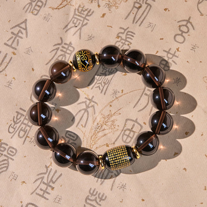 Bracelet Courage en obsidienne glacée et sanskrit estampillé or Buddha Stones