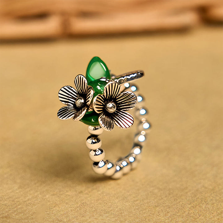 Bague porte-bonheur en alliage de cuivre avec motif de fleurs et Buddha Stones - 14-20 mm (corde élastique) - image 1