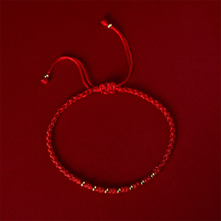 Bracelet de protection tressé en fil rouge avec perles dorées et pierres de Buddha Stones en argent sterling 925 - image 1