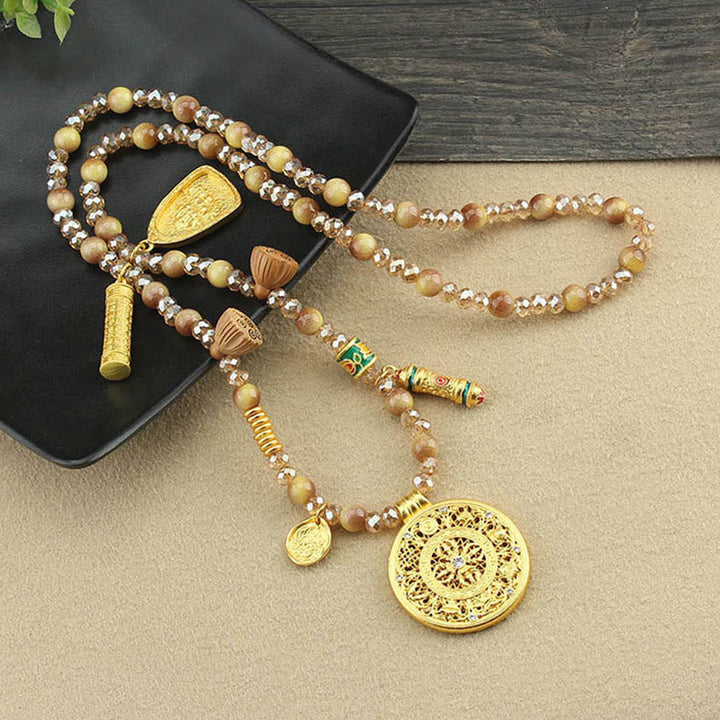 Collier pendentif en perles d'œil de tigre doré avec plaque ronde en forme de lotus tibétain en Buddha Stones - image 8