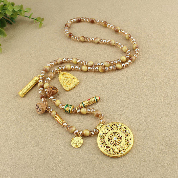 Collier pendentif en perles d'œil de tigre doré avec plaque ronde en forme de lotus tibétain en Buddha Stones - image 9