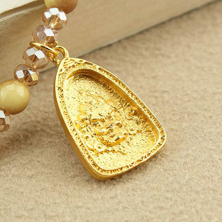 Collier pendentif en perles d'œil de tigre doré avec plaque ronde en forme de lotus tibétain en Buddha Stones - image 12