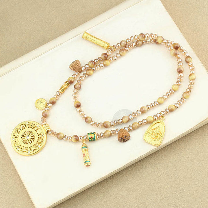 Collier pendentif en perles d'œil de tigre doré avec plaque ronde en forme de lotus tibétain en Buddha Stones - image 11