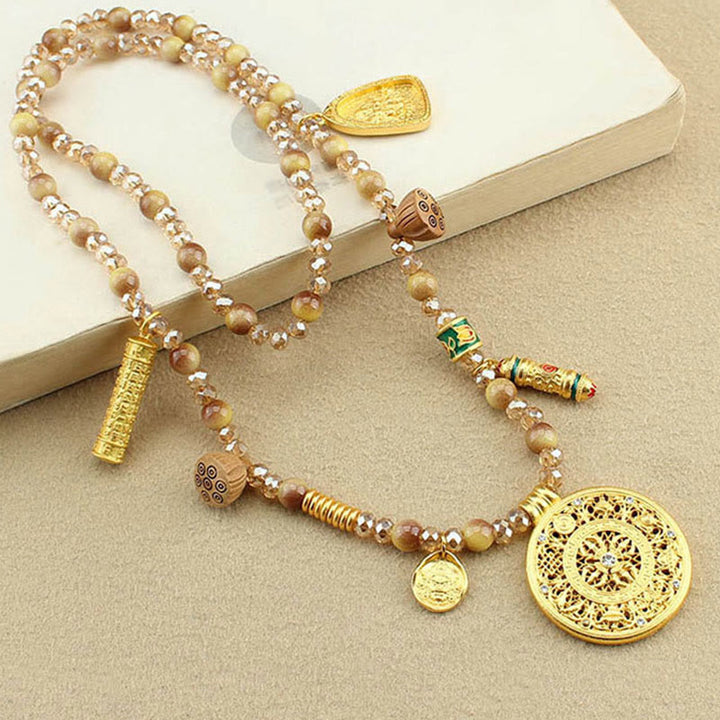Collier pendentif en perles d'œil de tigre doré avec plaque ronde en forme de lotus tibétain en Buddha Stones - image 3