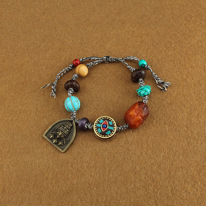 Bracelet de protection en corde avec Buddha Stones tibétaines, œil de Bouddha turquoise, lotus Zakiram - image 2