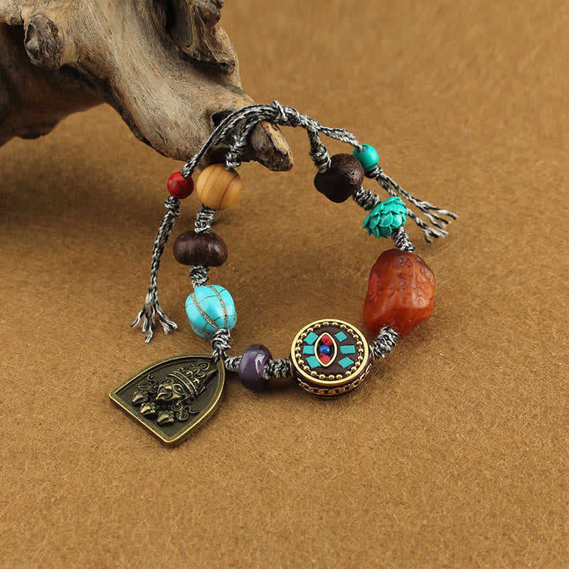 Bracelet de protection en corde avec Buddha Stones tibétaines, œil de Bouddha turquoise, lotus Zakiram - L'œil de Bouddha et Zakiram - image 1