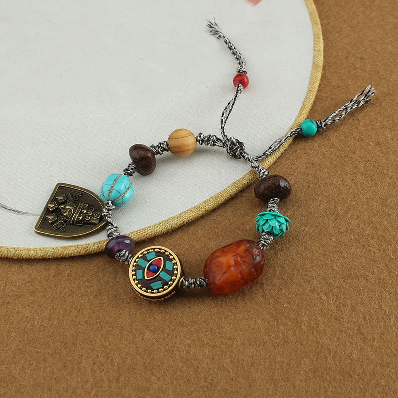 Bracelet de protection en corde avec Buddha Stones tibétaines, œil de Bouddha turquoise, lotus Zakiram - image 9