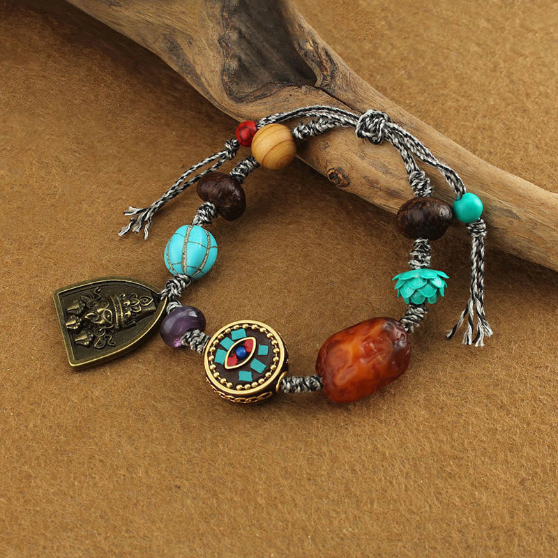 Bracelet de protection en corde avec Buddha Stones tibétaines, œil de Bouddha turquoise, lotus Zakiram - image 3