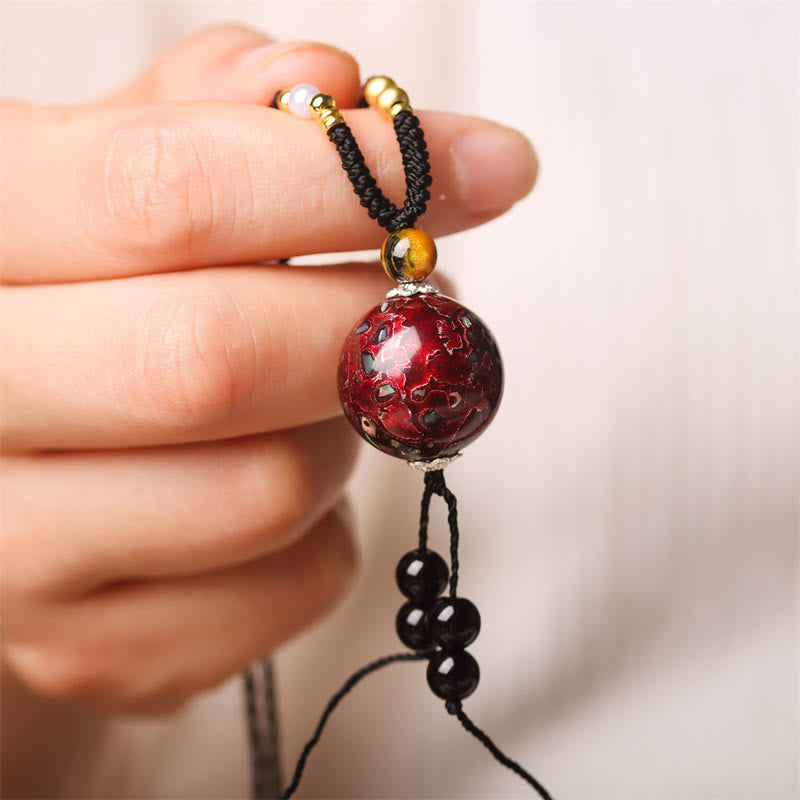 Collier pendentif en Buddha Stones, bois d'ébène, perles de Vénus Aurora, laque, artisanat de la paix - Charme rouge (rouge aléatoire) - image 1