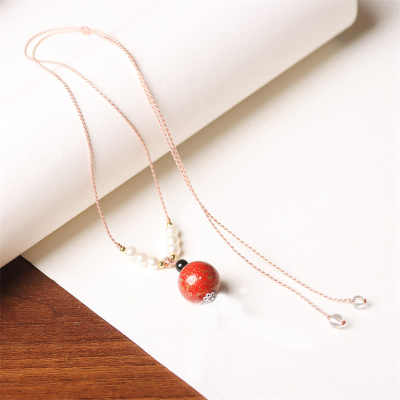 Collier pendentif en perles artisanales en bois d'ébène et laque Aurora , Buddha Stones - Rouge (rouge aléatoire) - image 10