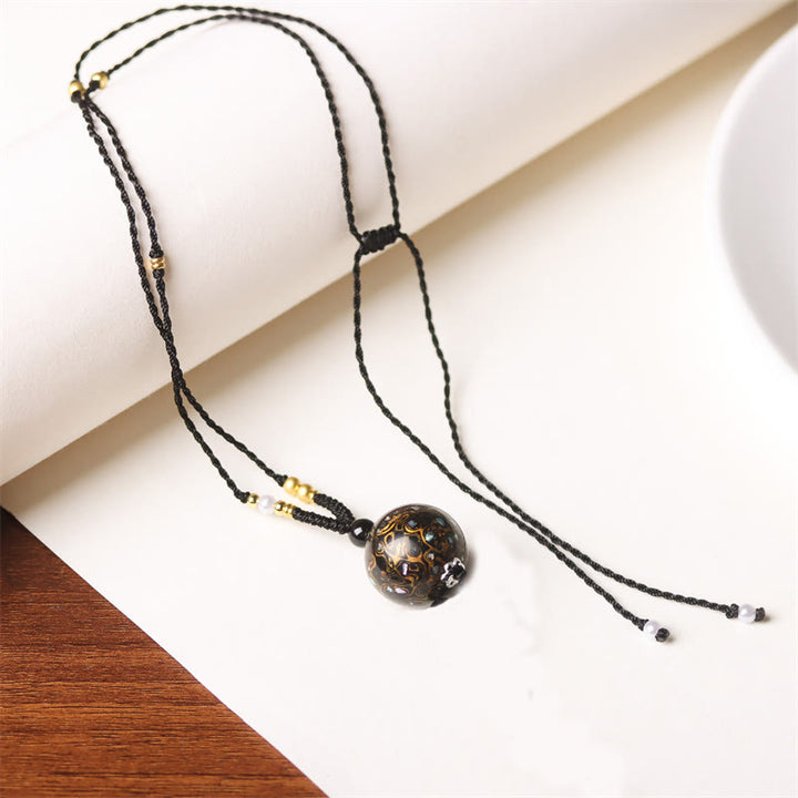 Collier pendentif en perles artisanales en bois d'ébène et laque Aurora , Buddha Stones - Or noir (or noir aléatoire) - image 19