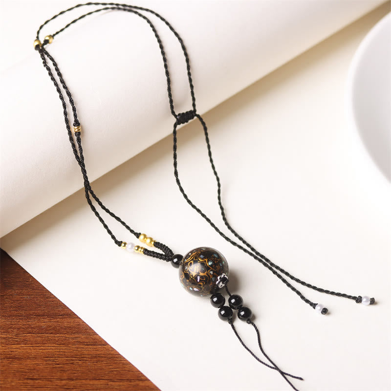 Collier pendentif en perles artisanales en bois d'ébène et laque Aurora , Buddha Stones - Breloque en or noir (or noir aléatoire) - image 17