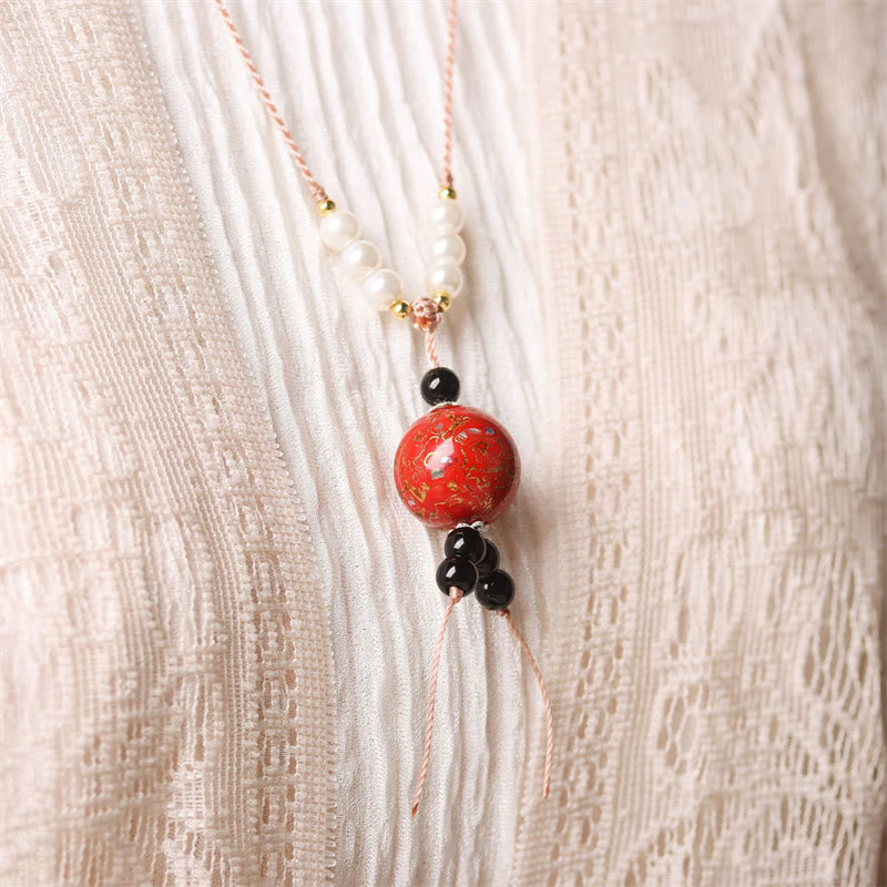 Collier pendentif en perles artisanales en bois d'ébène et laque Aurora , Buddha Stones - image 9
