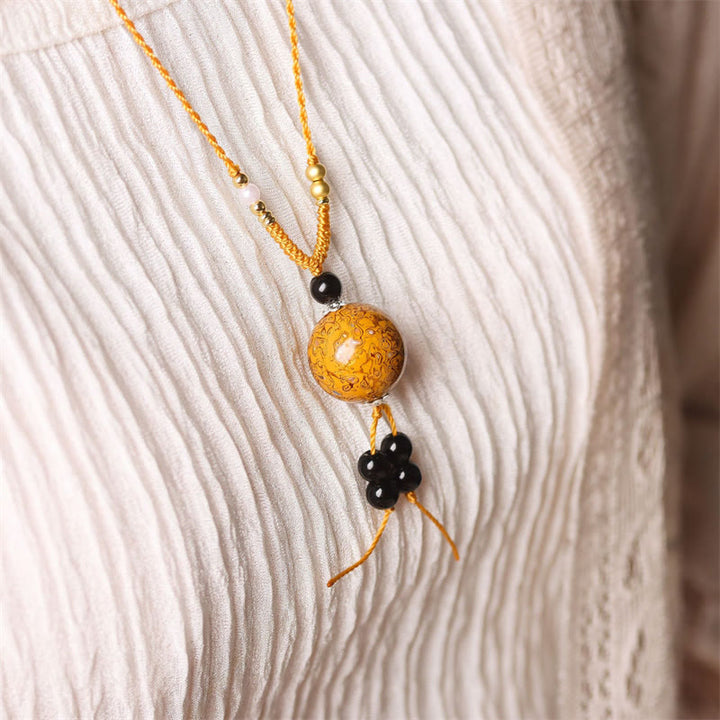 Collier pendentif en perles artisanales en bois d'ébène et laque Aurora , Buddha Stones - image 15