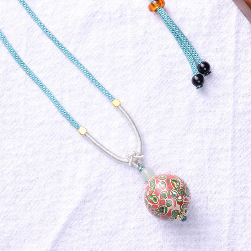 Collier pendentif en perles artisanales en bois d'ébène et laque colorée, Buddha Stones - image 3