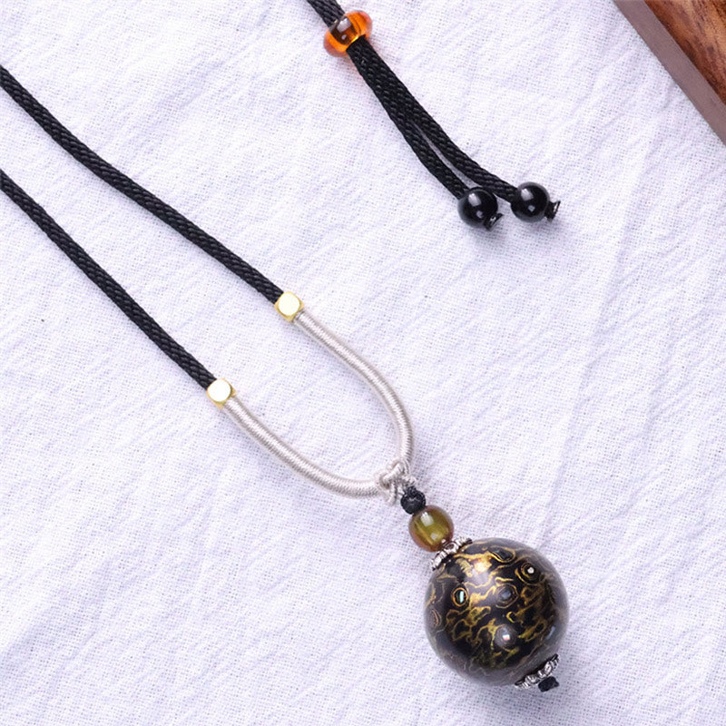 Collier pendentif en perles artisanales en bois d'ébène et laque colorée, Buddha Stones - image 8