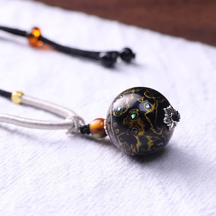 Collier pendentif en perles artisanales en bois d'ébène et laque colorée, Buddha Stones - image 9
