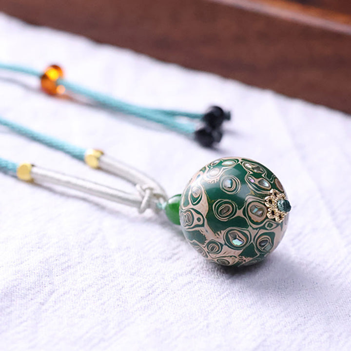 Collier pendentif en perles artisanales en bois d'ébène et laque colorée, Buddha Stones - image 15