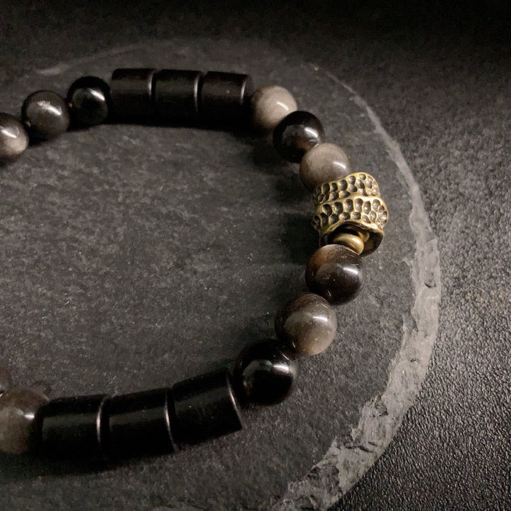 Bracelet de protection en obsidienne et ébène avec Buddha Stones et reflets argentés - image 7