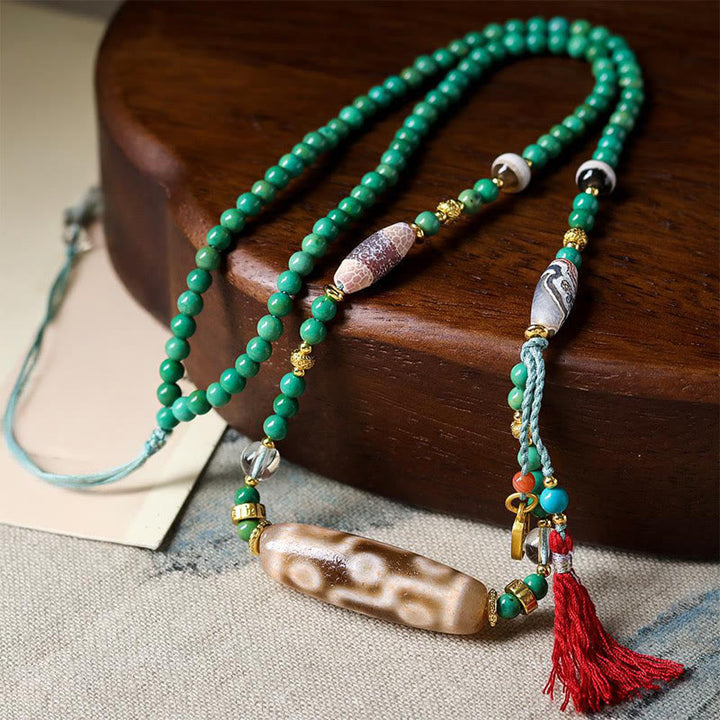 Collier pendentif de protection en perles turquoises et Buddha Stones tibétaines - Perle turquoise et dzi - image 1