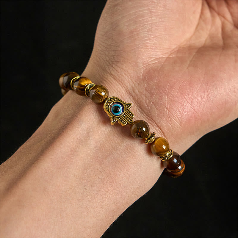 Bracelet courageux en perles œil de tigre et Buddha Stones - image 4