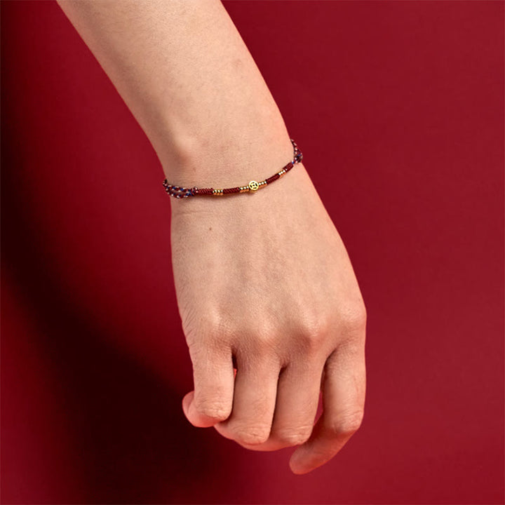 Bracelet porte-bonheur en cuivre tressé à la main avec Buddha Stones et pièces de monnaie rouges - image 5