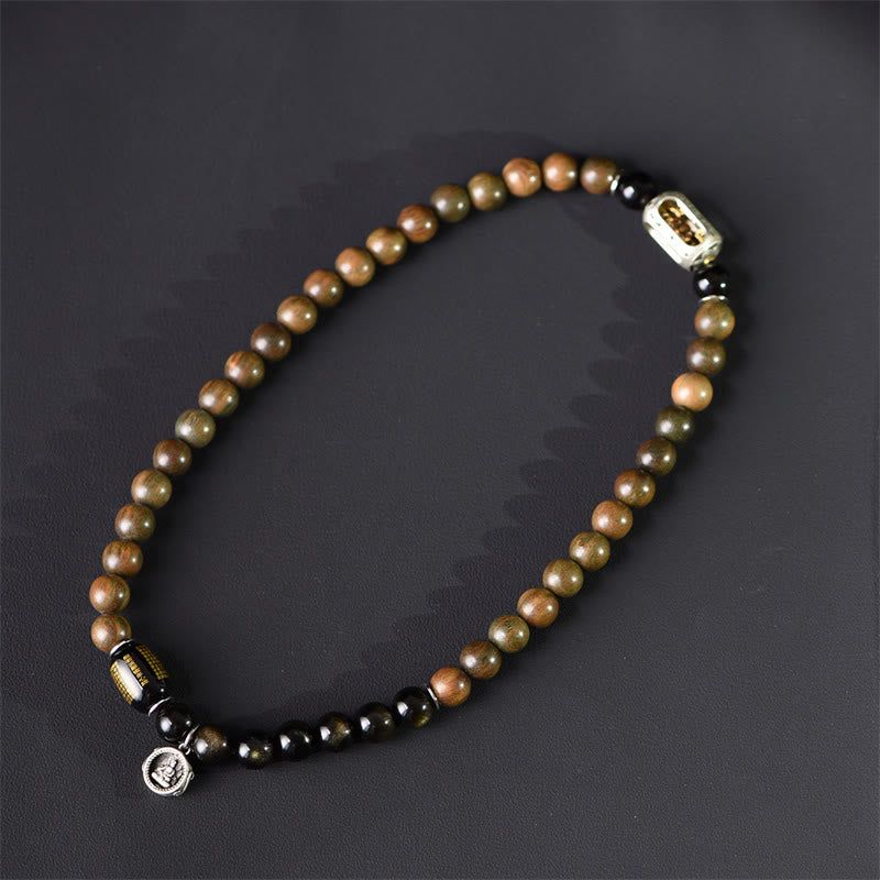 Bracelet double tour en obsidienne , Buddha Stones, bois de santal vert tibétain, reflets dorés, équilibre et paix - image 2