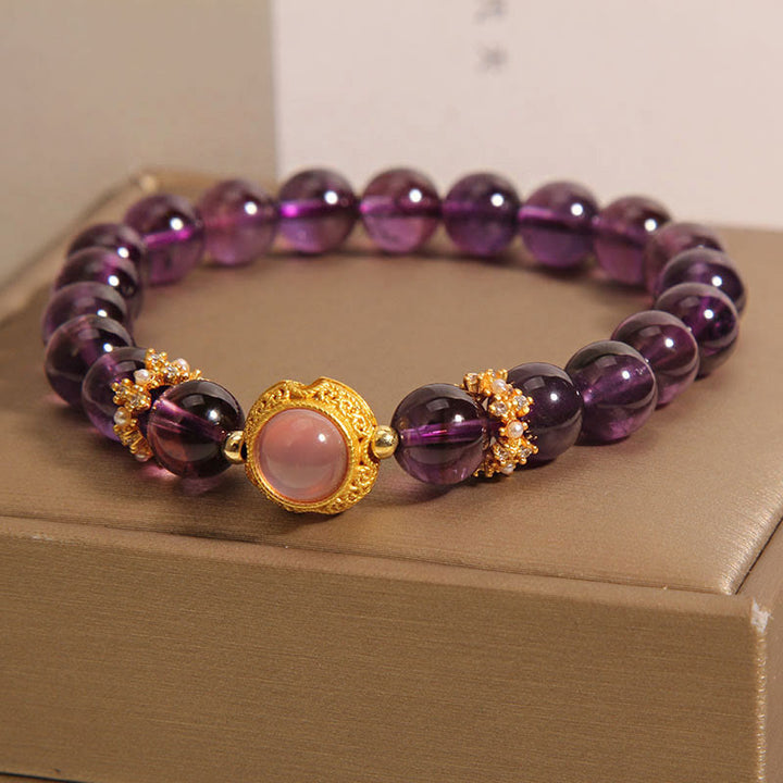 Bracelet de guérison en perles de quartz fraise et améthyste naturelle de Buddha Stones - image 2