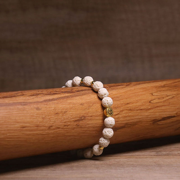 Bracelet de guérison et de calme en Buddha Stones de lave blanche, symbole Om - image 3