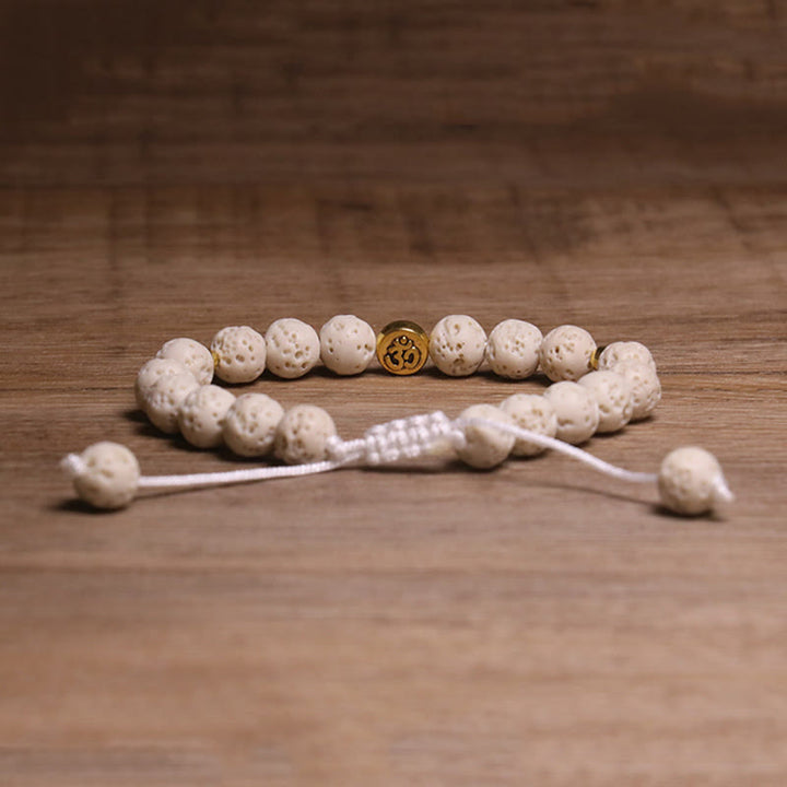 Bracelet de guérison et de calme en Buddha Stones de lave blanche, symbole Om - image 2