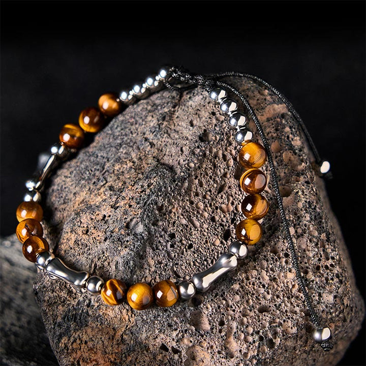 Bracelet de perles courageuses en œil de tigre avec joli motif osseux et Buddha Stones - Œil de tigre et acier titane (circonférence du poignet : 15-21 cm) - image 1