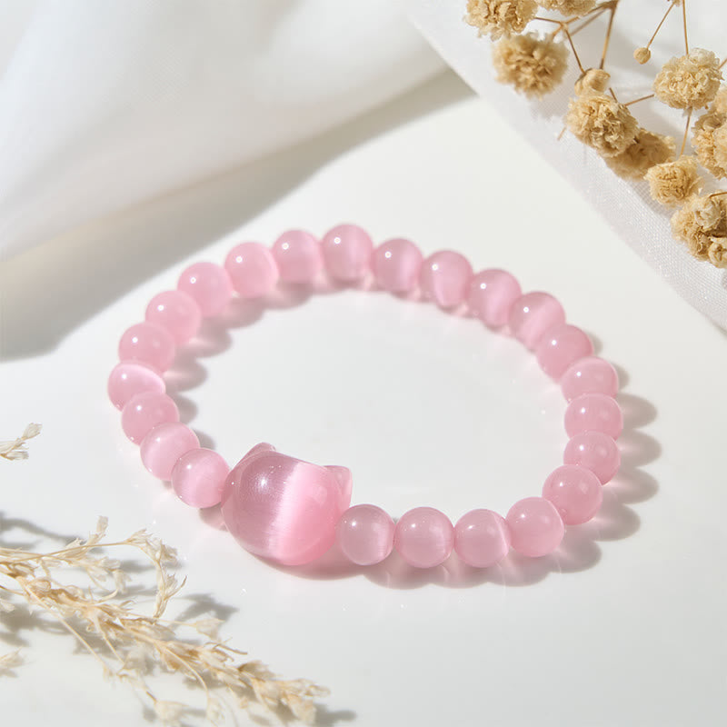 Bracelet de perles spirituelles en Buddha Stones, jolie tête de chat, œil de chat rose et œil de chat blanc - image 1