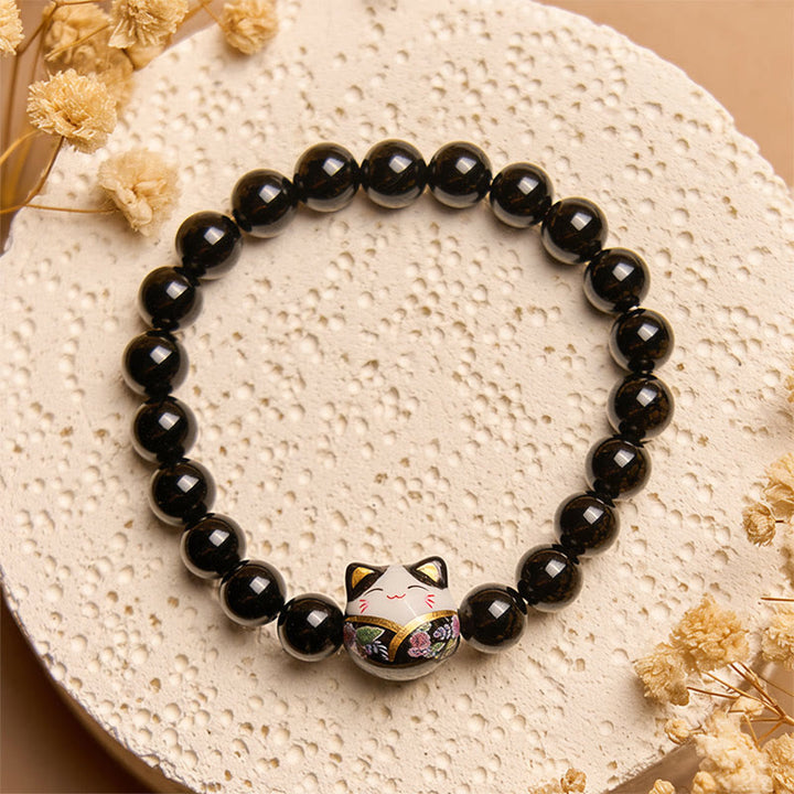 Bracelet porte-bonheur en céramique et onyx noir naturel avec Buddha Stones et chat noir - image 2