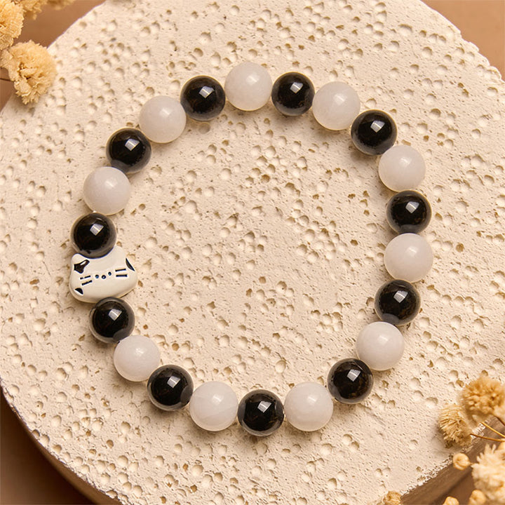 Bracelet porte-bonheur en Buddha Stones, chat bicolore, onyx noir, calcédoine blanche - image 3